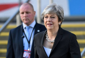 Royaume-Uni: May va appeler son gouvernement divisé à se 