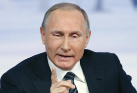 Devant la presse, Poutine joue l`apaisement avec Washington