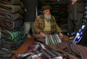 En Afghanistan broderies locales contre burqas chinoises