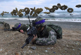Les USA annulent un exercice militaire avec Séoul