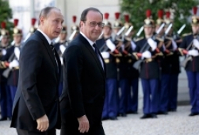 Paris accueille la rencontre Poutine-Hollande